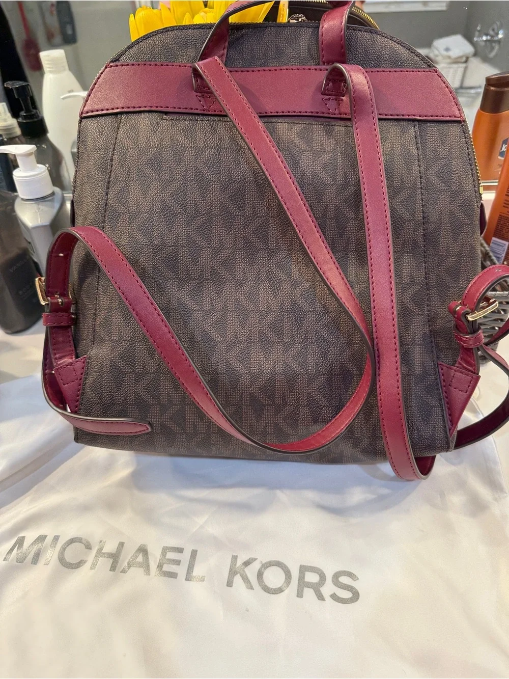 Michael Kors Brown Logo Backpack with Burgundy Trim and Gold Hardware